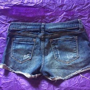 Jean shorts with cheetah print pockets